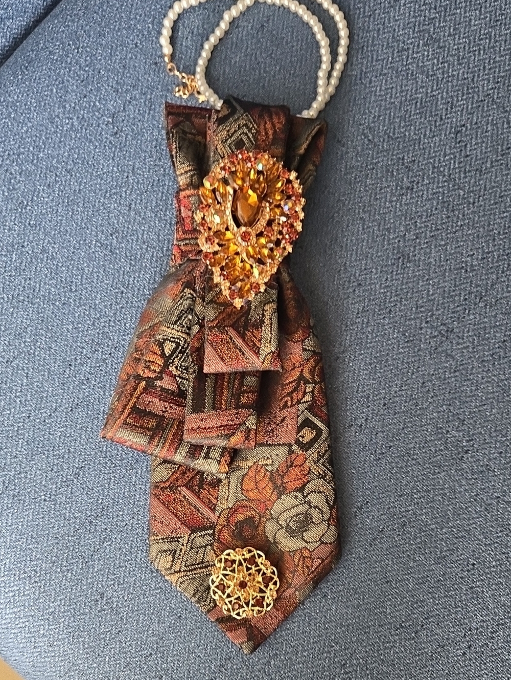 3/$60 Brown Purple Paisley Cravat with Amber Jeweled Brooch Accent